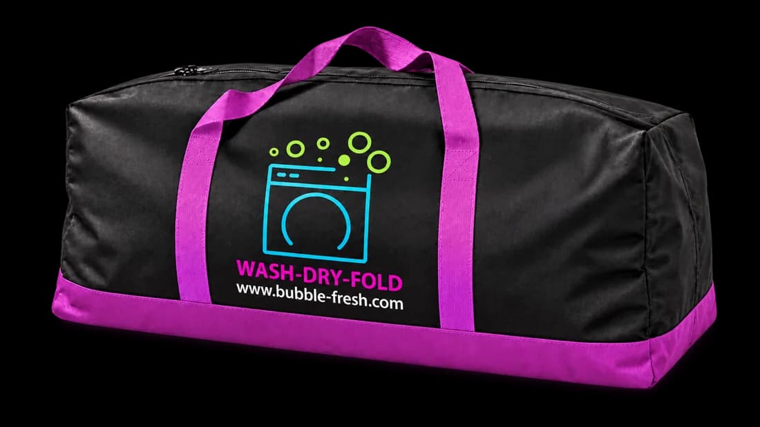 The reusable Bubble Fresh laundry bag with purple handles
